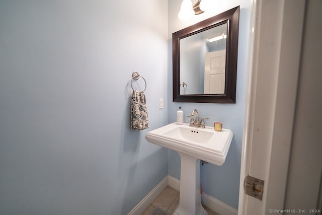 bathroom featuring tile patterned flooring