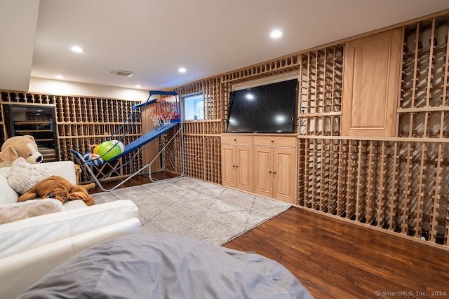 wine cellar featuring light wood-type flooring