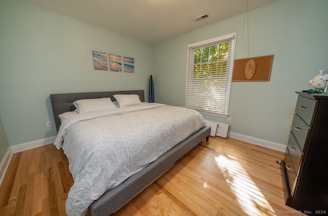 bedroom featuring light hardwood / wood-style floors