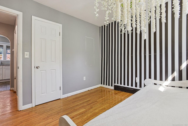 bedroom featuring hardwood / wood-style floors