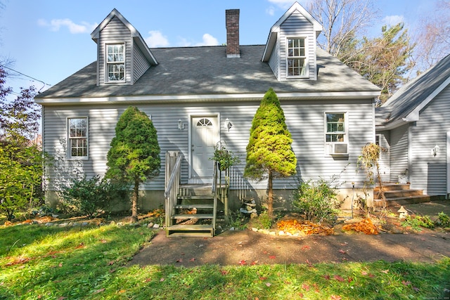 view of front of home featuring cooling unit