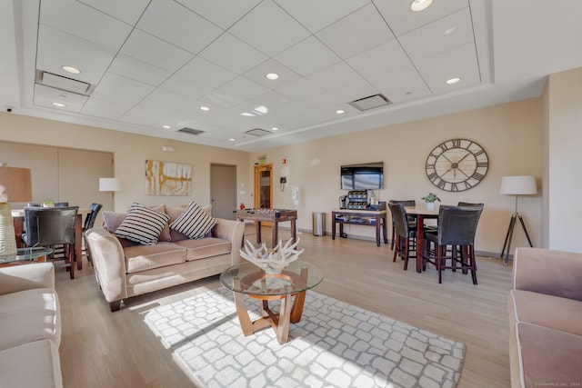 living room with light hardwood / wood-style flooring