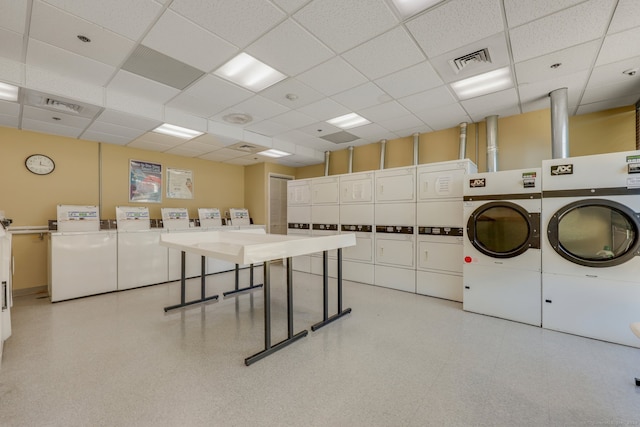 laundry room featuring stacked washer / drying machine and independent washer and dryer