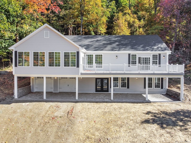 back of property featuring a carport