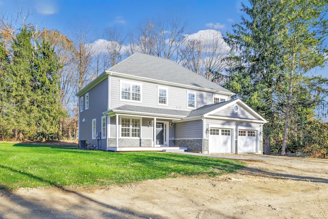 front of property with covered porch, central AC, a front lawn, and a garage