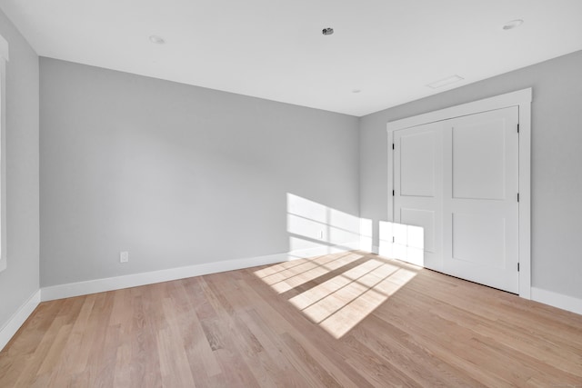 empty room with light wood-type flooring