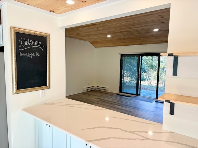 interior space with wood ceiling, a baseboard radiator, recessed lighting, and wood finished floors