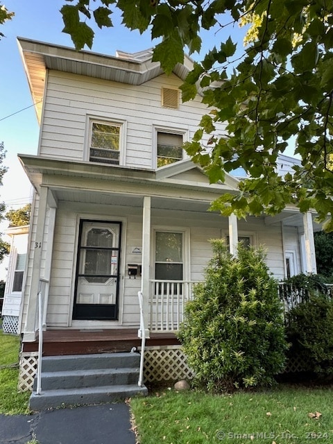 view of front of home featuring covered porch