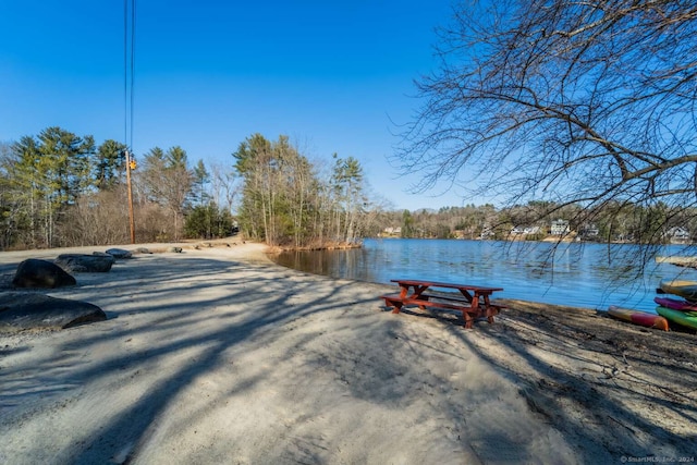 exterior space with a water view