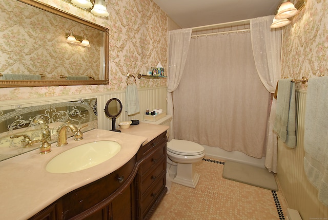 full bathroom featuring vanity, toilet, shower / bath combination with curtain, and tile patterned flooring