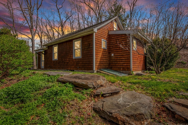 view of property exterior at dusk