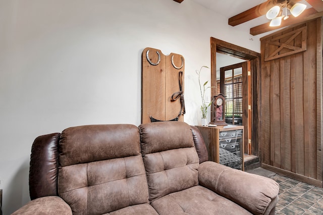 living room with beamed ceiling