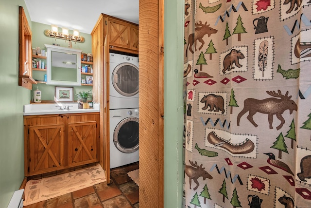 laundry room with stacked washer and dryer