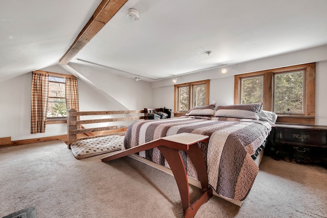 carpeted bedroom featuring vaulted ceiling