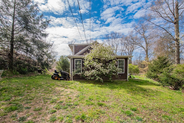 exterior space with a front lawn