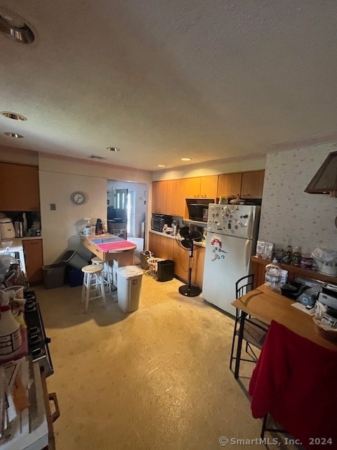 kitchen with white fridge