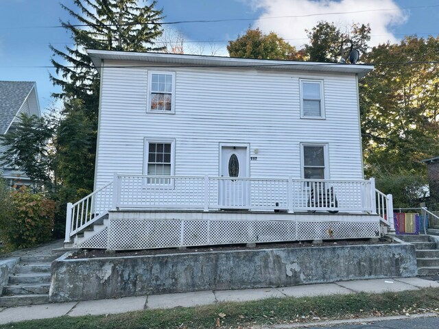 view of front facade featuring a wooden deck