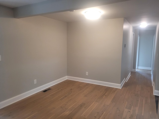 empty room featuring hardwood / wood-style floors