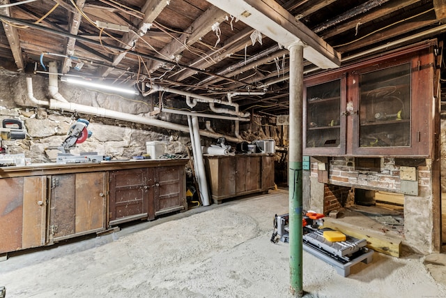 basement with a workshop area