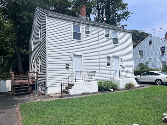 view of front of property with a front yard