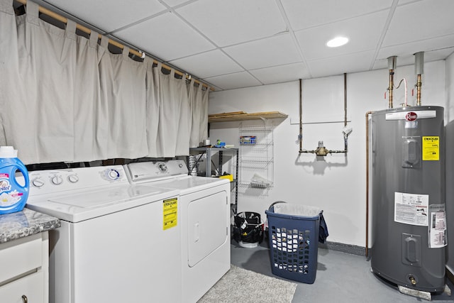 washroom with water heater and independent washer and dryer