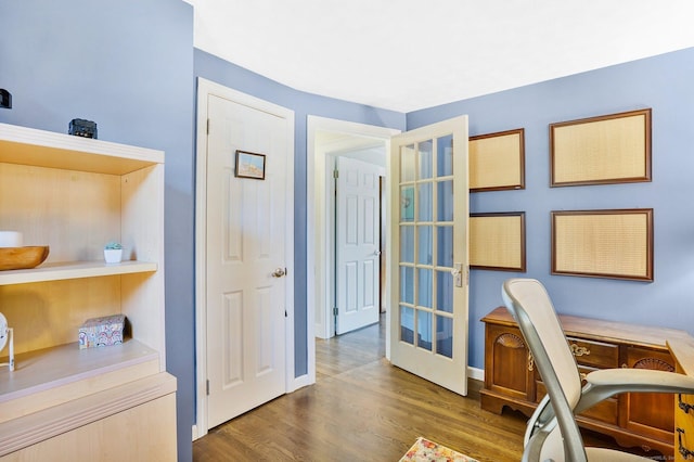 office space with wood finished floors