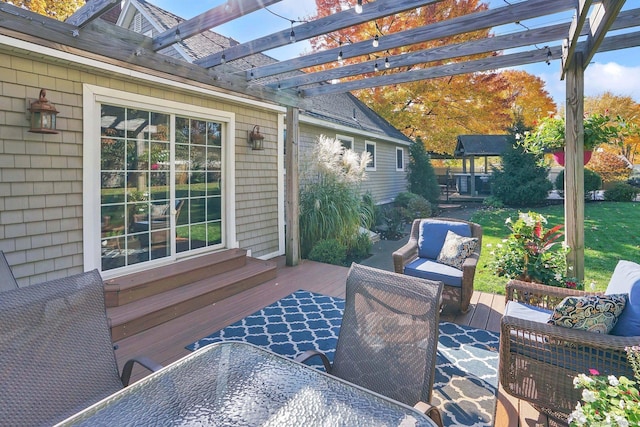 view of patio featuring outdoor dining area, outdoor lounge area, entry steps, a pergola, and a wooden deck