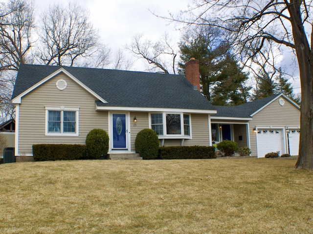 single story home with a garage, a shingled roof, a chimney, and a front yard