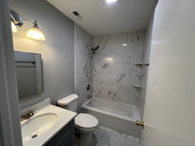 full bathroom with toilet, tiled shower / bath combo, and vanity