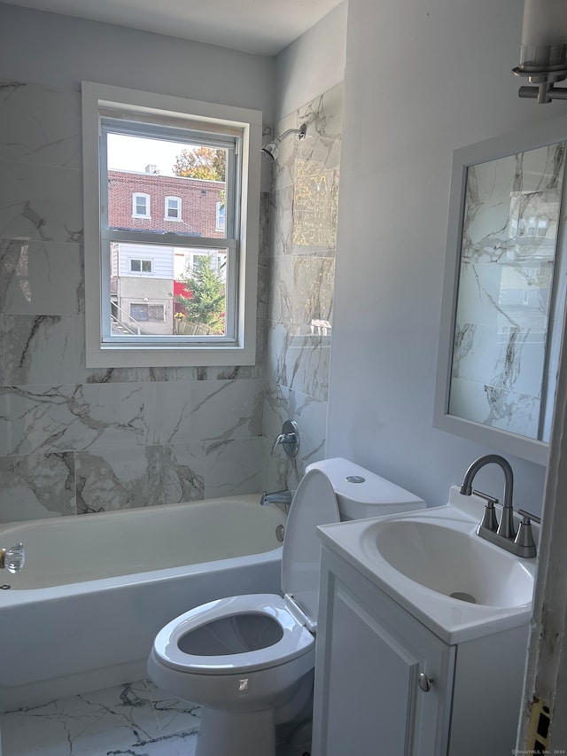 full bathroom featuring vanity, tub / shower combination, and toilet