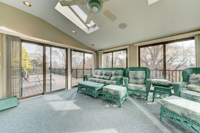 sunroom / solarium featuring plenty of natural light and vaulted ceiling with skylight