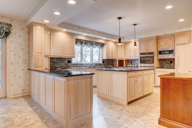 kitchen with stainless steel appliances, backsplash, light brown cabinetry, pendant lighting, and a tray ceiling