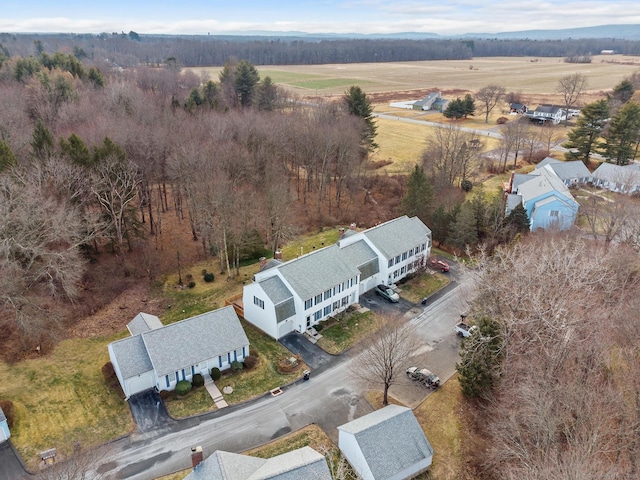 birds eye view of property with a rural view