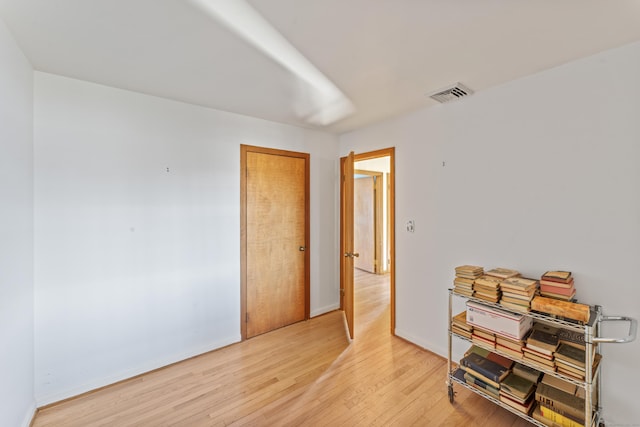 empty room with light wood-type flooring