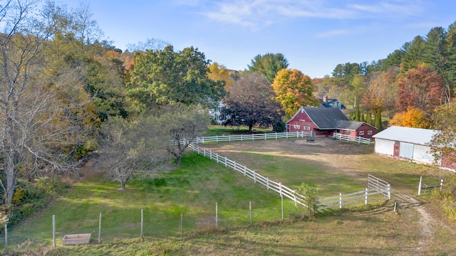 birds eye view of property featuring a rural view