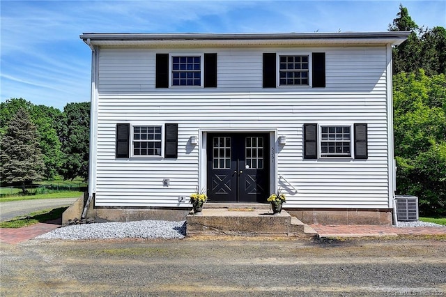 view of front of house with cooling unit