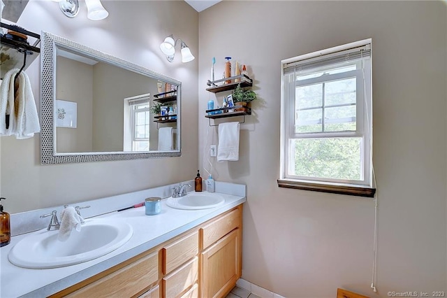 bathroom with vanity and tile patterned flooring