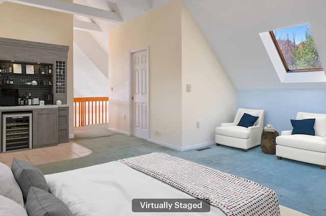 carpeted bedroom featuring lofted ceiling with beams, beverage cooler, and indoor bar