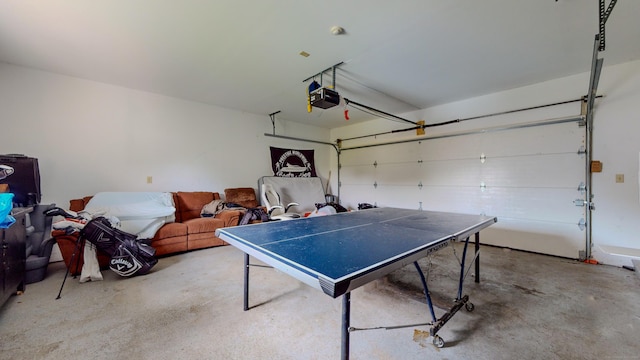 game room with a garage and concrete floors