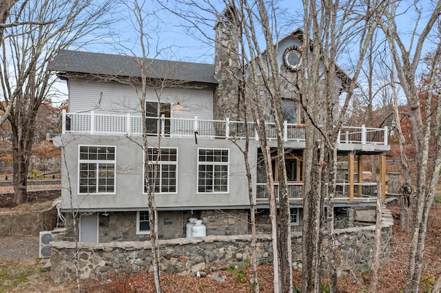 exterior space featuring a balcony