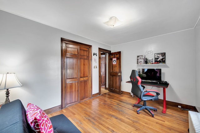 home office featuring hardwood / wood-style flooring