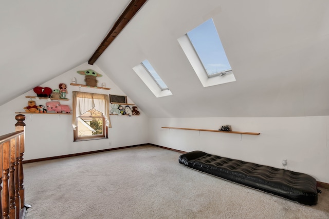 additional living space with lofted ceiling with beams and carpet