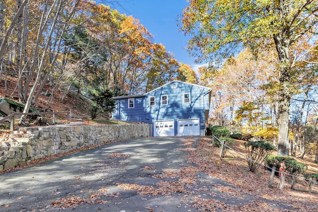 view of home's exterior with a garage