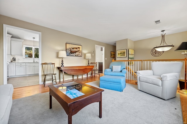 living room featuring light hardwood / wood-style floors