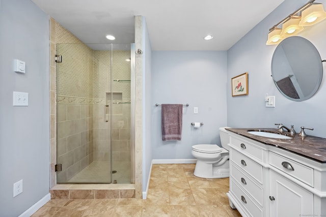 bathroom featuring vanity, toilet, tile patterned floors, and walk in shower