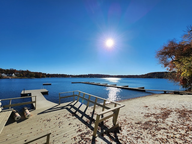 view of dock with a water view