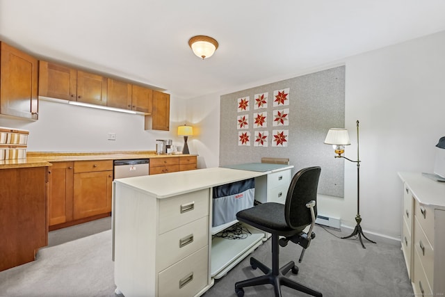 office with a baseboard heating unit and light colored carpet