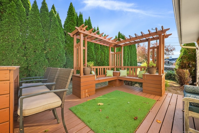 wooden terrace with a pergola