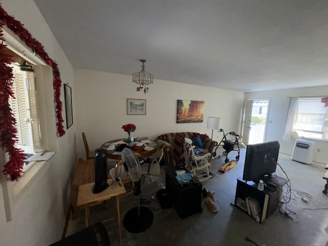 living room featuring a chandelier