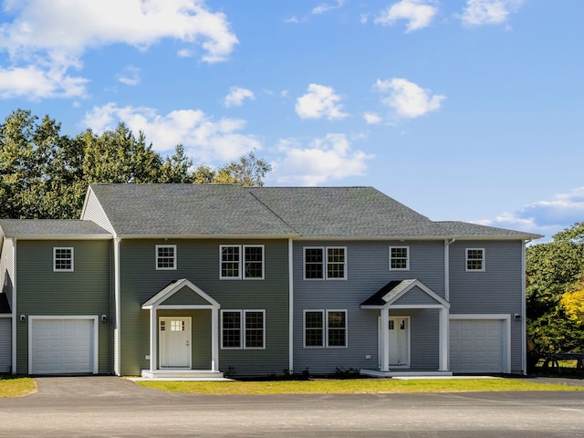 colonial-style house featuring a garage